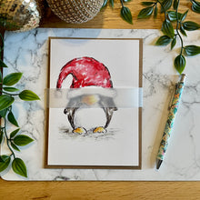 Load image into Gallery viewer, Penguin Santa Hat Over Eyes - Christmas Card
